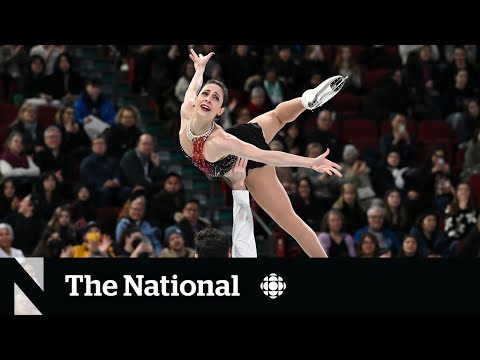 Canada's Deanna Stellato-Dudek and Maxime Deschamps captured gold in the pairs competition Thursday night at the ISU World Figure Skating Championships.